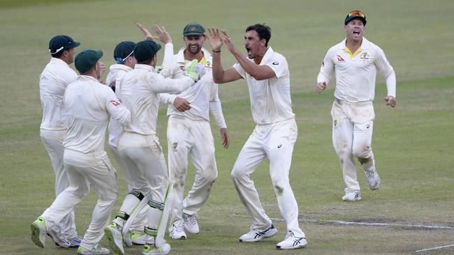 DURBAN, SOUTH AFRICA - MARCH 04: Mitchell Starc of Australia celebrates the wicket of Kagiso Rabada of the Proteas during day 4 of the 1st Sunfoil Test match between South Africa and Australia at Sahara Stadium Kingsmead on March 04, 2018 in Durban, South Africa. (Photo by Lee Warren/Gallo Images/Getty Images)