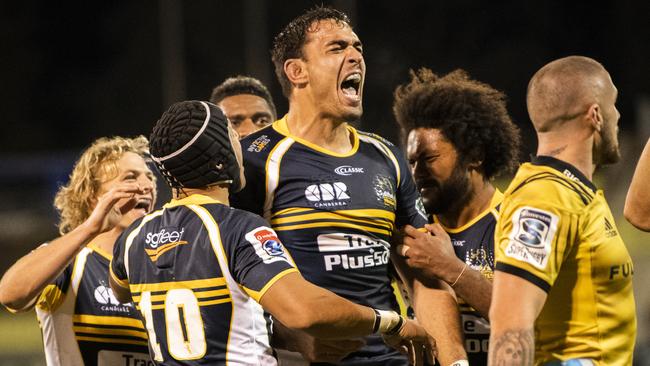 Rory Arnold celebrates after scoring a try as the Brumbies downed the Hurricanes. Pic: AAP