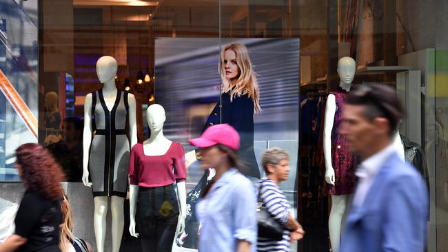 Pedestrians walk past a women's fashion store in Pitt Street Mall in Sydney. Picture: AAP