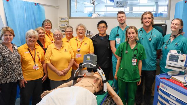 United Hospital Auxiliary members with LBH staff and the donated LUCAS Stryker machine chest compression system worth $24,981.