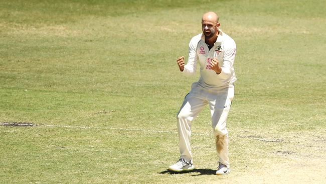 Nathan Lyon of Australia celebrates taking the wicket of Rishabh Pant of India during day five of the Third Test match in the series between Australia and India at Sydney Cricket Ground on January 11, 2021 in Sydney, Australia. (Photo by Mark Kolbe/Getty Images)