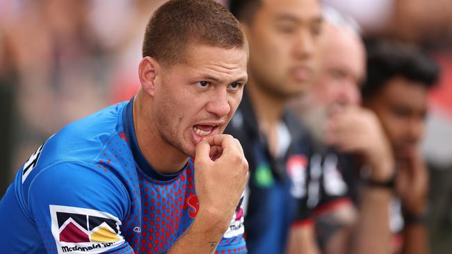 Kalyn Ponga watches from the bench after being knocked out early in Newcastle’s round 2 clash with Wests Tigers at Leichhardt Oval. Picture: Getty Images