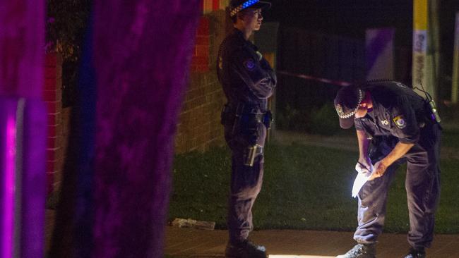 Police search the area for evidence. Picture: Chris McKeen