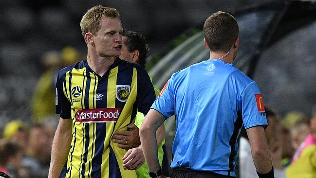 Central Coast Mariners captain Matt Simon after being sent off against Brisbane Roar. Picture: AAP 