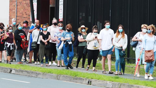 Residents from the area queue for testing at Wollongong Hospital on Wednesday. Picture: John Feder