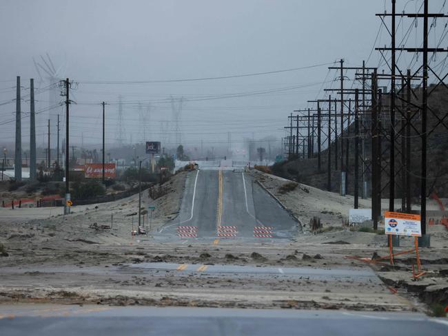 A road is washed out as Tropical Storm Hilary heads north into Palm Springs, California. Picture: AFP