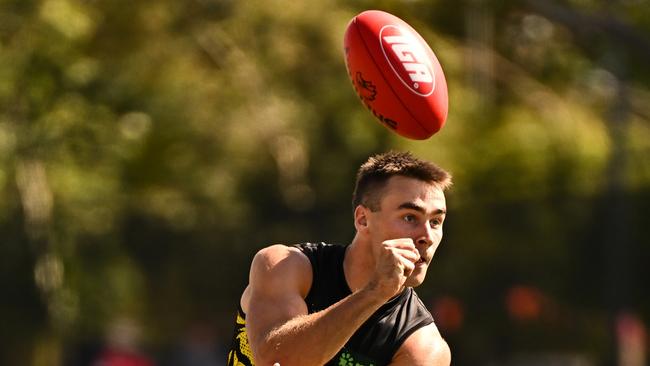 PERTH, AUSTRALIA - FEBRUARY 17: Seth Campbell of the Tigers handpasses the ball during the 2025 AFL Match Simulation between the West Coast Eagles and the Richmond Tigers at Mineral Resources Park on February 17, 2025 in Perth, Australia. (Photo by Daniel Carson/AFL Photos via Getty Images)