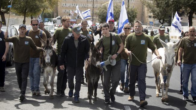 Protesters demand equality in military service near the Prime Minister’s office in Jerusalem this week. Picture: Getty Images