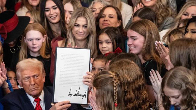 The order bans transgender girls and women from competing on sports teams that match their gender identity, marking his latest move targeting transgender rights. (Photo by ANDREW CABALLERO-REYNOLDS / AFP)