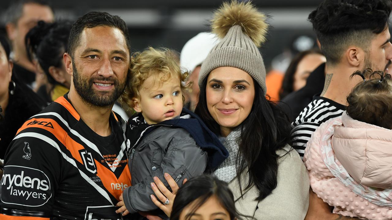 Benji Marshall of the Tigers with with son Benjamin Fox and wife Zoe. AAP Image/Joel Carrett.