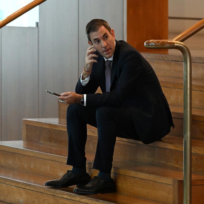 Treasurer Jim Chalmers takes a breather at Parliament House in Canberra on Sunday. Picture: AAP