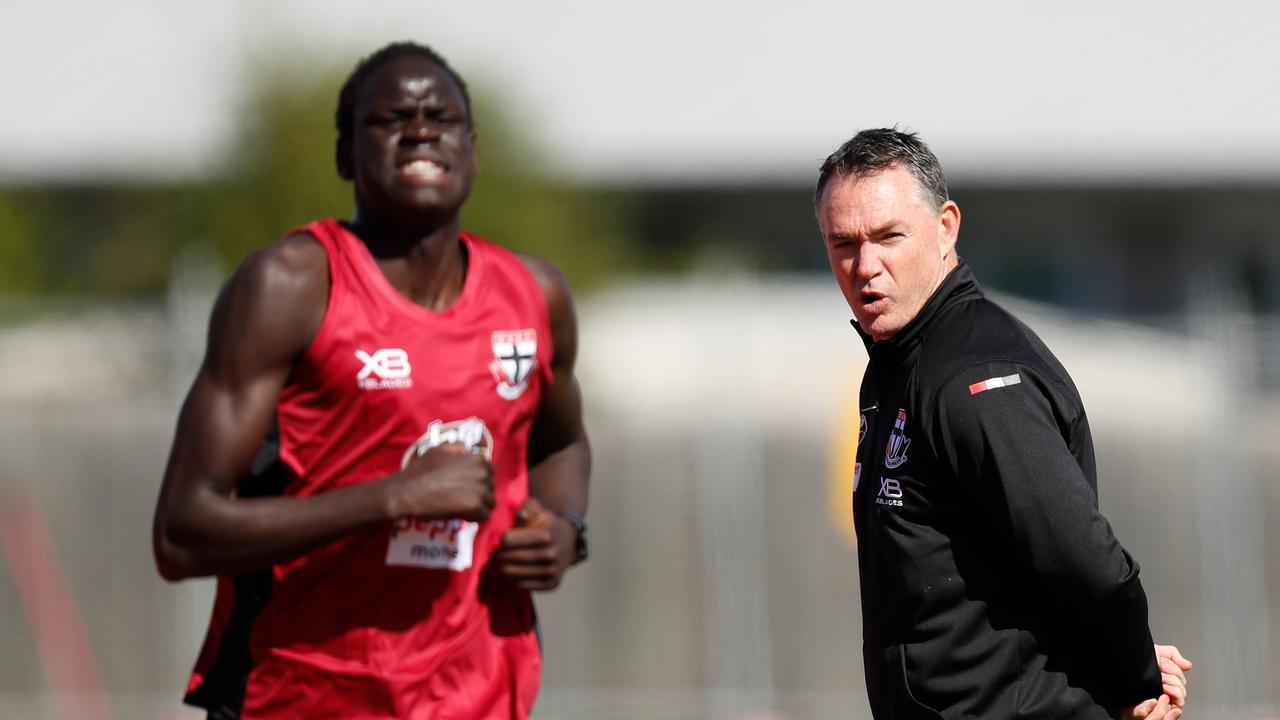 Alan Richardson encourages Tom Jok during a recent time-trial.