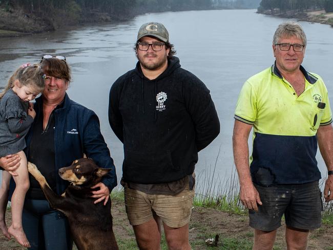 ***PICTURES EMBARGOED ...SUNDAY TELEGRAPH EXCLUSIVE USE ONLY...DO NOT USE ANYWHERE ELSE WITHOUT PRIOR PERMISSION FROM WEEKEND TELEGRAPH PICTURE DESK***27th April 2022. The Sunday Telegraph. News.Wilberforce, NSWPics by Julian Andrews.Election coverage portrait of Wilberforce locals including flood victims talking about key election issues in Macquarie. Pictured on the banks of The Hawkesbury River in Wilberforce are (L-R):Raelene Hodgskin holding her grand-daughter Alice Sultana (3) and dog Rusty.Cameron Hodgskin (her son) (25).Husband Anthony Hodgskin (55)Paul Saad (43).All from Wilberforce.