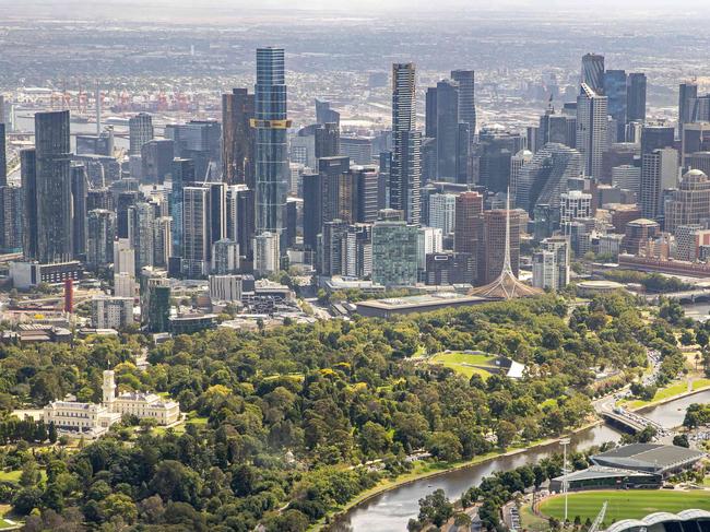 Generic aerial views over Melbourne from Microflight helicopter. Approaching the CBD from the East over the Yarra River, With the MCG, Government House, Royal Botanical Gardens, Tennis Center, Rod Laver Arena, AAMI Park visible. Picture: Jason Edwards