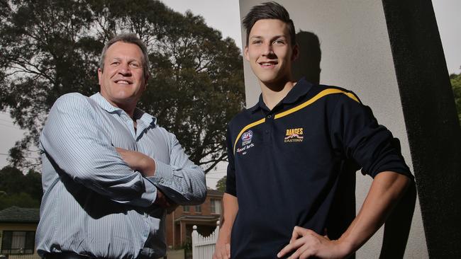 Mark Wiedeman and son Sam at home on Wednesday, December 3, 2014, in Vermont, Australia. Mark is Murray Wiedeman's son (the Pies 1958 premiership captain), and Sam is one of the young star forwards eligible for next year's draft. Picture: Hamish Blair