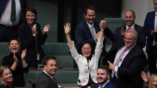 Scott Morrison declares Gladys Liu the winner after the newly elected Liberal MP delivered her maiden speech in the House of Representatives yesterday. Picture: Kym Smith