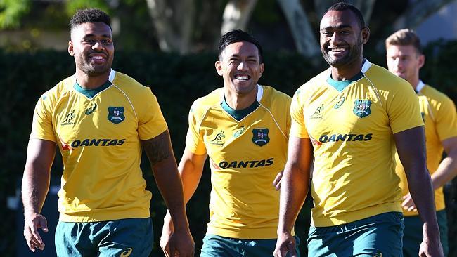 Samu Kerevi, Christian Lealiifano and Tevita Kuridrani during the Wallabies team photo session at Ballymore in Brisbane yesterday. Picture: Adam Head