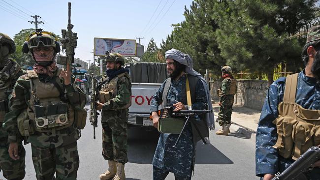 Taliban Fateh fighters, a "special forces" unit, stand guard along with other fighters on a street in Kabul, as suicide bomb threats hung over the final phase of the US military's airlift operation from Kabul. Picture: AFP