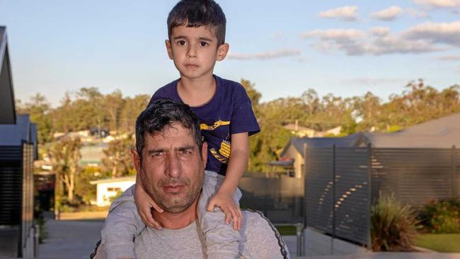 Iranian asylum seeker Shamsullah Piri and his son, Ryan. Picture: Dominic Elsome