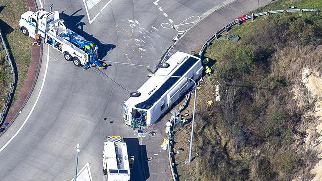 HUNTER VALLEY, AUSTRALIA - NCA NewsWire Photos - 12 JUNE, 2023: Aerial scene coverage from the site where ten people have died, and 11 people were hospitalised after a bus carrying wedding guests crashed in the Hunter Valley., Picture: NCA NewsWire / Christian Gilles