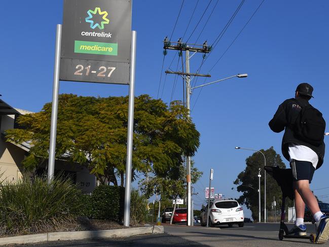 Centrelink signage is seen outside the Centrelink office  in Logan south of Brisbane,  Wednesday, August 23, 2017. The Turnbull government has chosen Logan for it's welfare drug-testing trial but the city's mayor is angry about the lack of consultation. (AAP Image/Dave Hunt) NO ARCHIVING