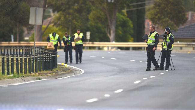 Police process the scene of the crash. Picture: Jay Town