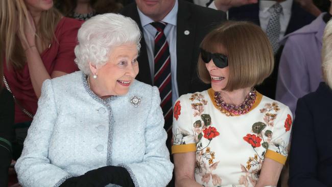 Queen Elizabeth II with Vogue chief Anna Wintour at Richard Quinn's runway show, London Fashion Week, in 2018. Picture: Yui Mok, Getty Images Images)