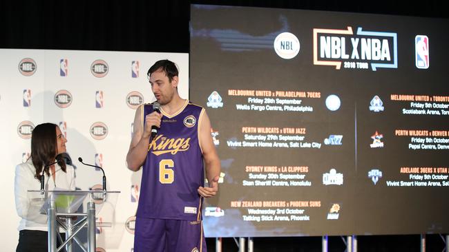 MC Neroli Meadows speaks with Andrew Bogut of the Sydney Kings at the announcement of the plan for five NBL teams to participate in the NBA preseason. Picture: Getty Images