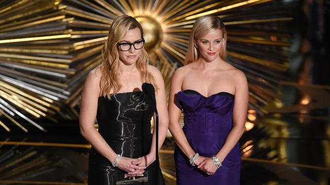 Winslet (L) and Witherspoon speak onstage during the 88th Annual Academy Awards in 2016. Picture: Kevin Winter/Getty Images