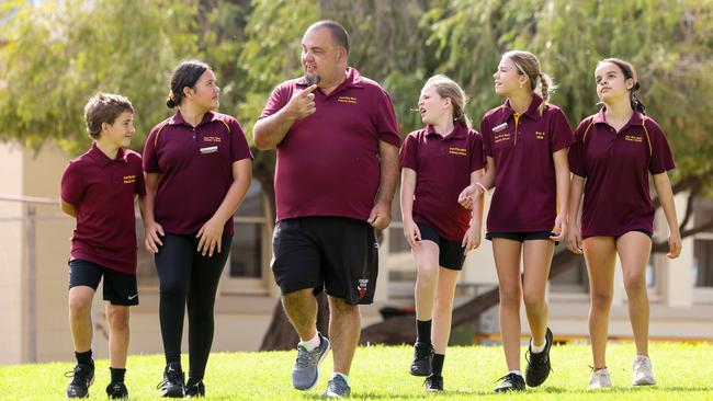 Port Pirie West Primary School Aboriginal community education officer Danny Martin with students. Picture: Russell Millard