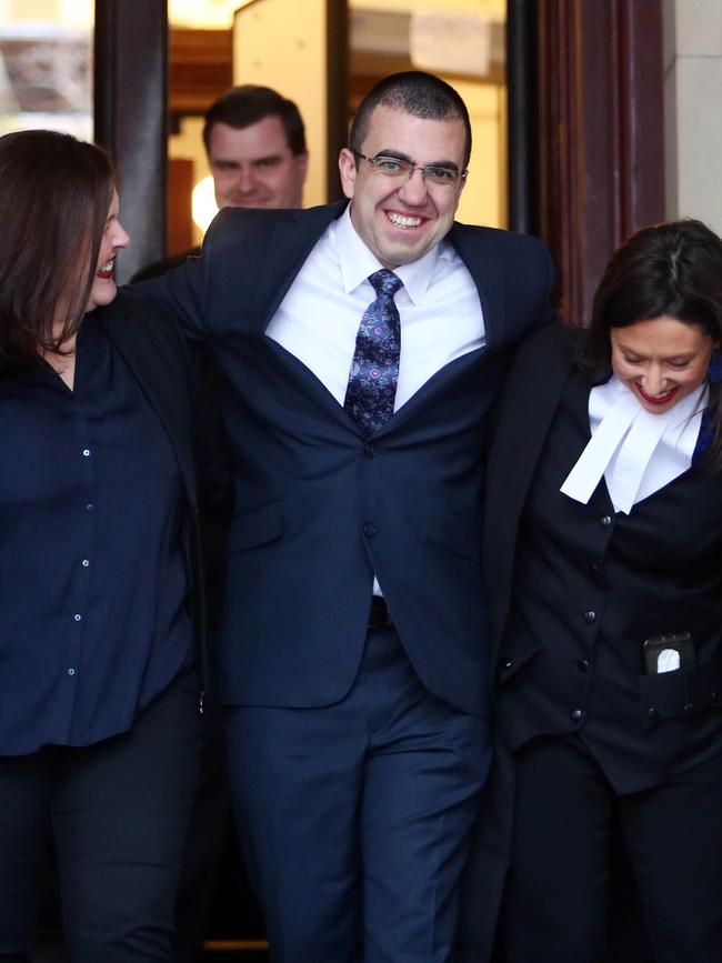 Faruk Orman walks out with his legal team. Picture: Aaron Francis/The Australian