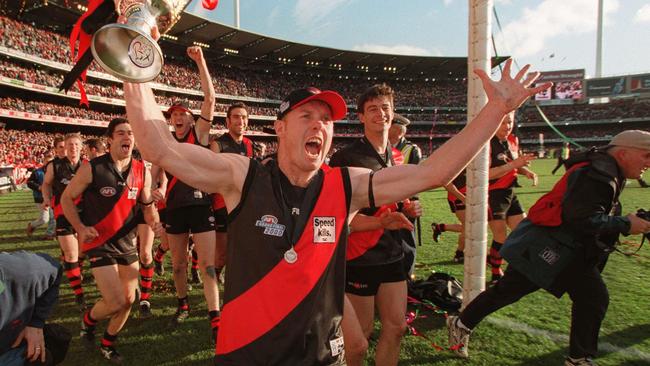 Paul Barnard celebrates Essendon’s premiership triumph in 2000.