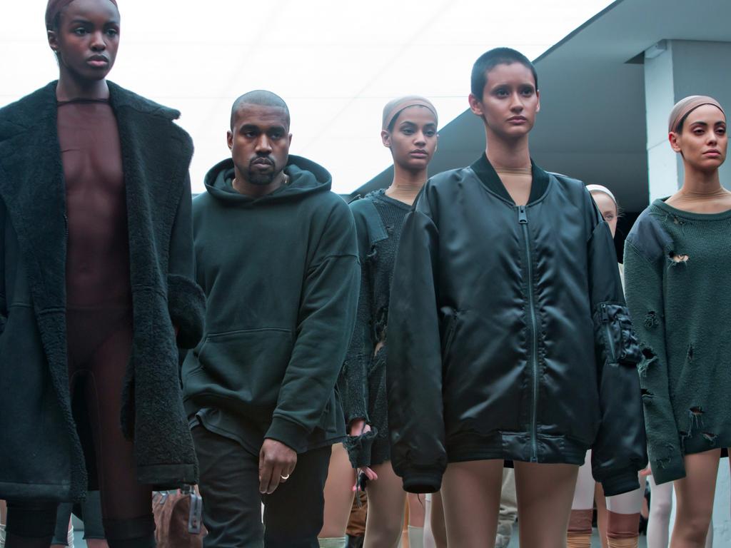 Kanye West appears with models on the runway at the Adidas Originals x Kanye West YEEZY SEASON 1 fashion show during New York Fashion Week. Picture: AP