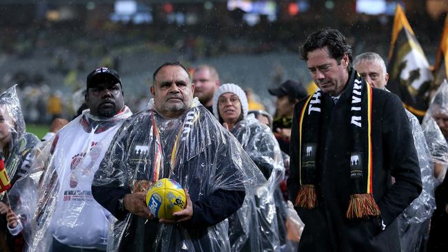 Michael Long and AFL CEO Gillan McLachlan finish The Long Walk in 2019.