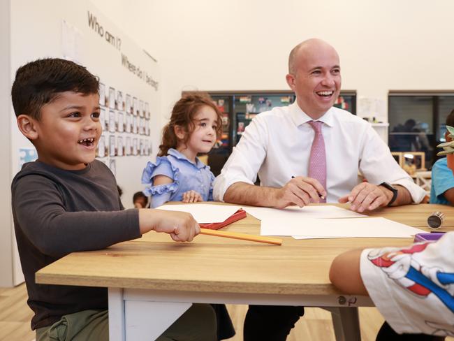 Wasey Islam, 4, and Lilya Hamdan, 4, with NSW Treasurer Matt Kean, at Goodstart Early Learning. Picture: Justin Lloyd.