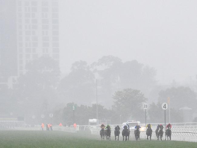 MELBOURNE, AUSTRALIA - NOVEMBER 06:  General view of wet conditions in Race 1, Bumble Stakes  during Melbourne Cup Day at Flemington Racecourse on November 6, 2018 in Melbourne, Australia.  (Photo by Vince Caligiuri/Getty Images)