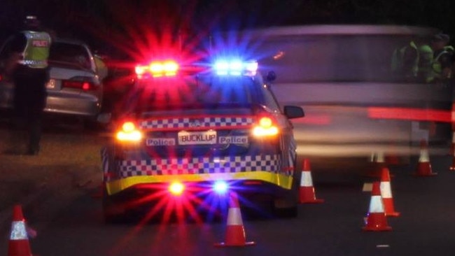 A woman has been taken into custody accused of assaulting the driver of a vehicle she crashed into and of drink driving.