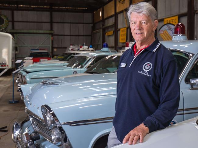 Curator Bill Prior with historic South Australian Police cars at the SA Police Historical Society museum. Pictured on March 29th 2023. Picture: Ben Clark