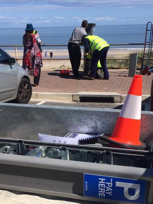 Paid parking meters getting removed from the Henley foreshore today. Picture: Susan Brame and Lloyd Thornton