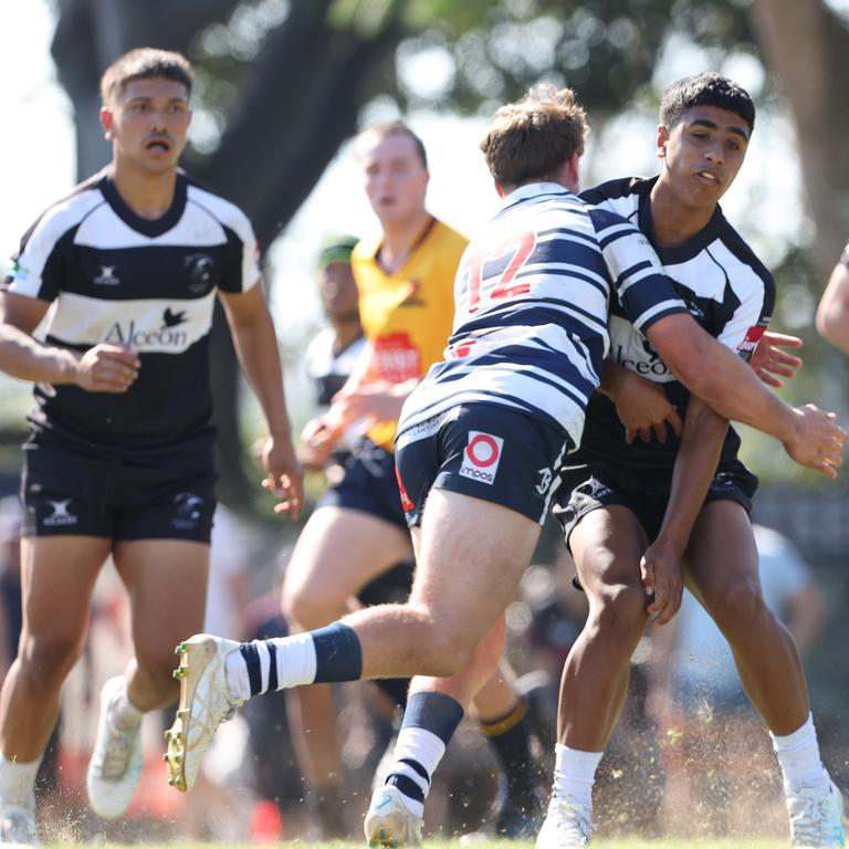 Isaac Kefu (right). Action from the Under 16 Brisbane junior rugby league grand final between Brothers and Souths at Norman Park. Picture Lachie Millard