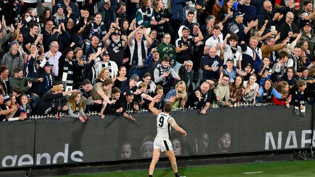 Fans react as Patrick Cripps of the Blues celebrates. Photo by Morgan Hancock/AFL Photos via Getty Images.