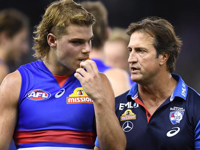 MELBOURNE, AUSTRALIA - APRIL 21: Bulldogs head coach Luke Beveridge talks to Bailey Smith during the round 5 AFL match between Western Bulldogs and Carlton at Marvel Stadium on April 21, 2019 in Melbourne, Australia. (Photo by Quinn Rooney/Getty Images)