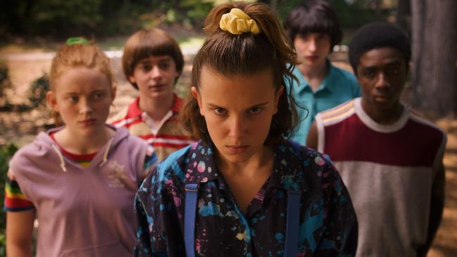 Sadie Sink, Noah Schnapp, Millie Bobby Brown, Finn Wolfhard and Caleb McLaughlin in a scene from season three of Stranger Things. Picture: Supplied by Netflix.