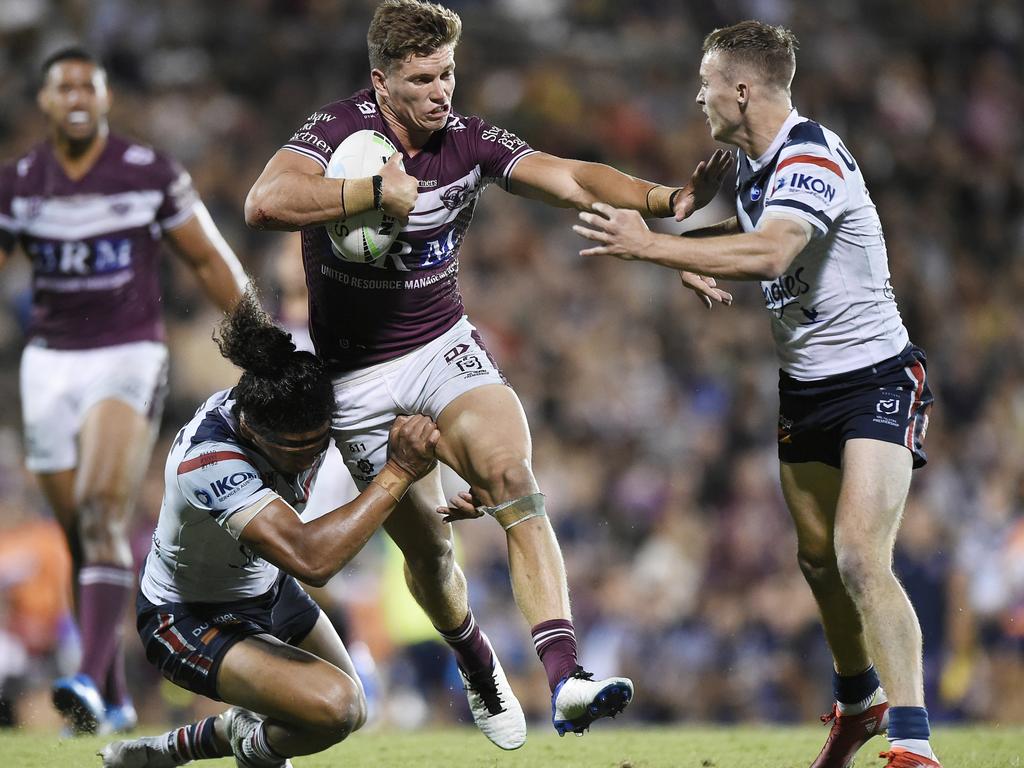 Reuben Garrick of the Sea Eagles is tackled during the NRL Semi-Final match between the Manly Sea Eagles and the Sydney Roosters at BB Print Stadium on September 17, 2021 in Mackay, Australia. Picture: Matt Roberts