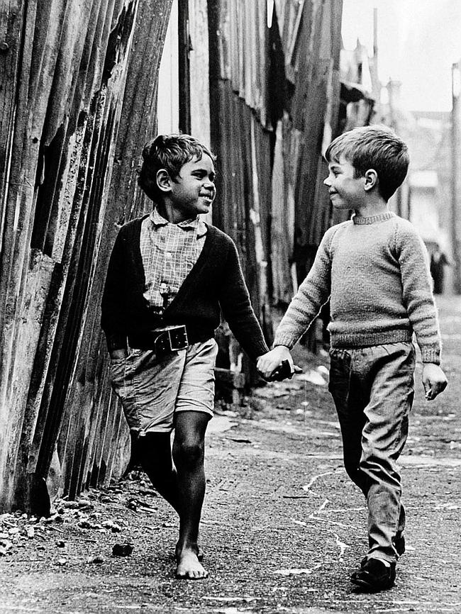 Two boys playing together on a Sydney street on the eve of the 1967 referendum.