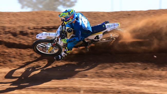 Victorian Jack Simpson goes high on his Husqvarna on his way to the fastest time in Saturday's prologue. Picture: Finke Desert Race