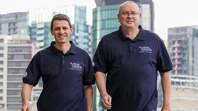 Police Chief Commissioner Graham Ashton and Police Association Secretary Wayne Gatt are walking 1000km to help battle . Picture : Ian Currie