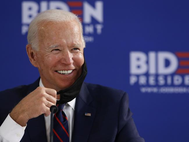 Democratic presidential candidate former Vice President Joe Biden smiles while speaking during a roundtable on economic reopening with community members, Thursday, June 11, 2020, in Philadelphia. (AP Photo/Matt Slocum)