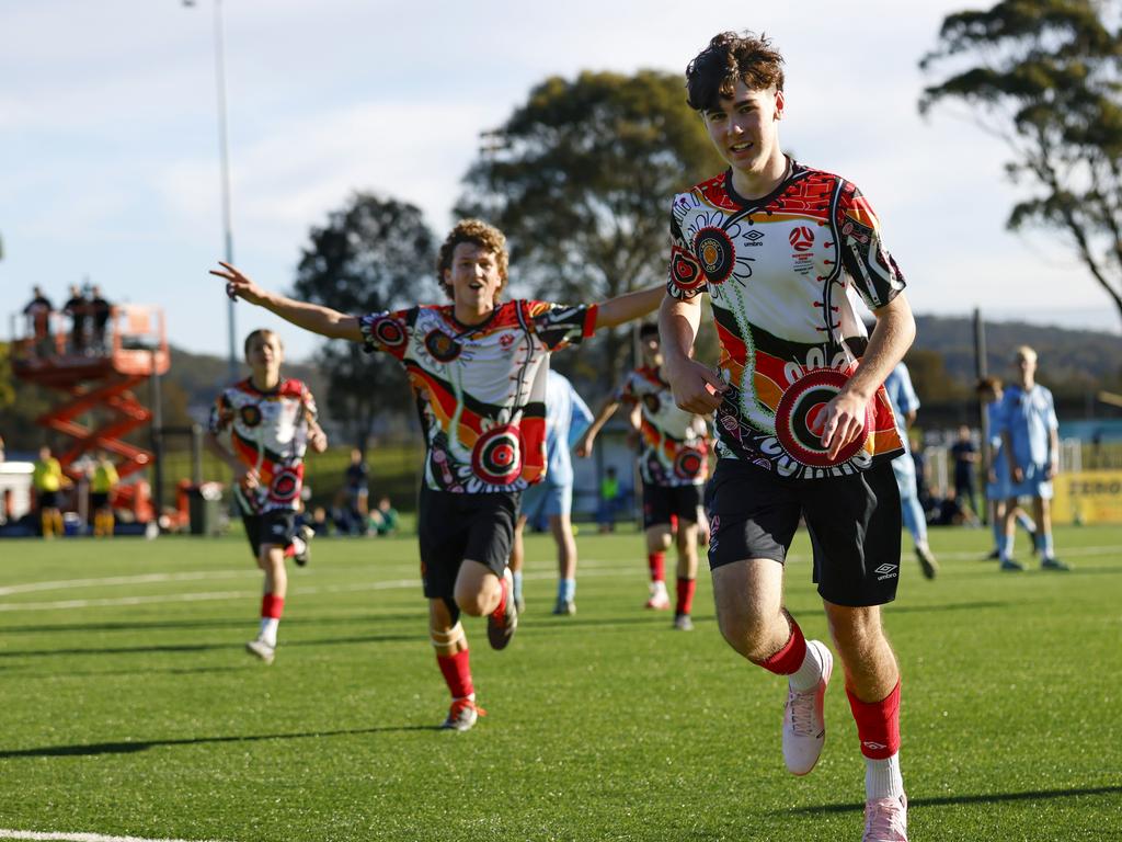 Ashtyn Ferguson celebrates a goal. Picture: Michael Gorton. U16 Boys NAIDOC Cup at Lake Macquarie Regional Football Facility.