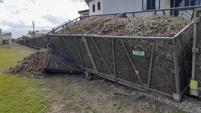 Emergency services responded after a cane train derailed in Ingham on July 24. Picture: Cameron Bates